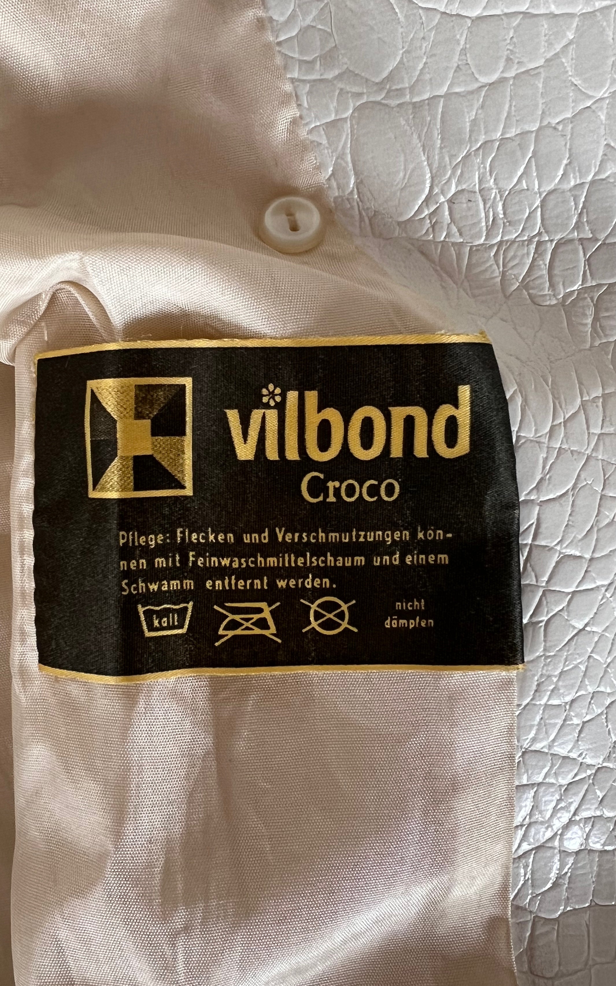 Cappotto in vinile vintage anni '60